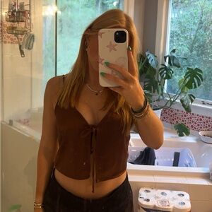 Brown silk top that ties in front. Super cute, just rotating my style